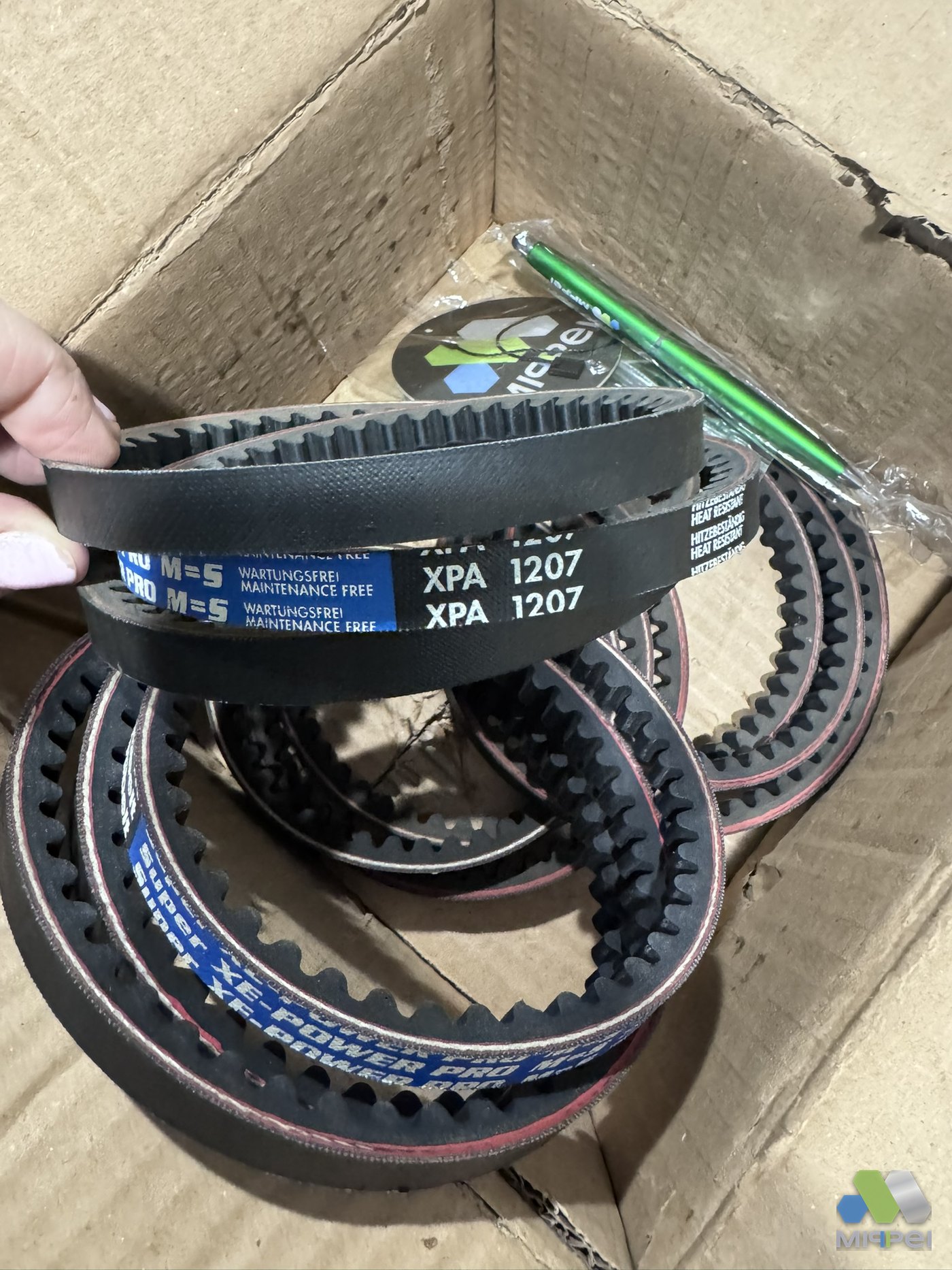 Jogo de correias Optibelt XPA 1207 na embalagem original do fabricante — Mippei